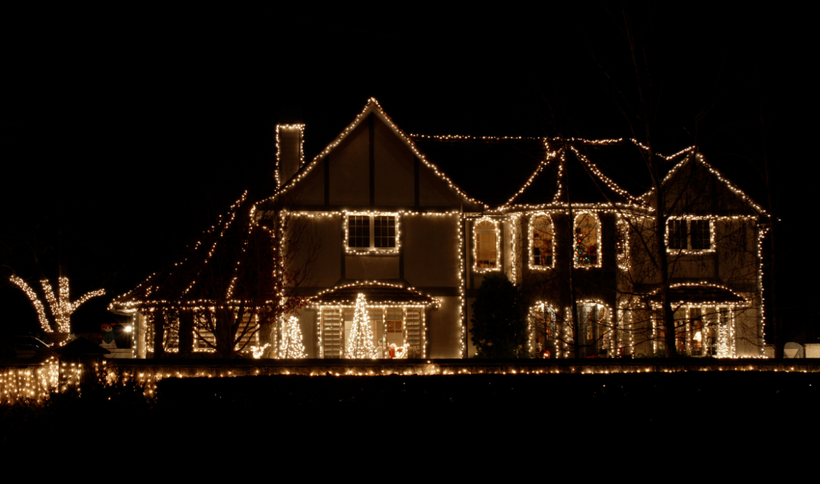 house has white christmas lights on it